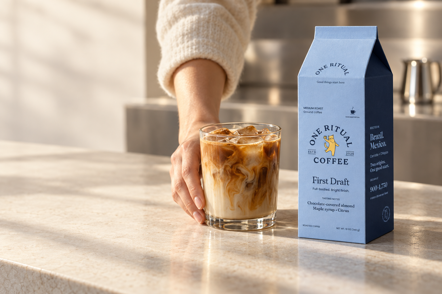 First Draft coffee beside an iced latte